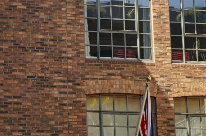 Brick building exterior on the CFO Launchpad roundtable cover