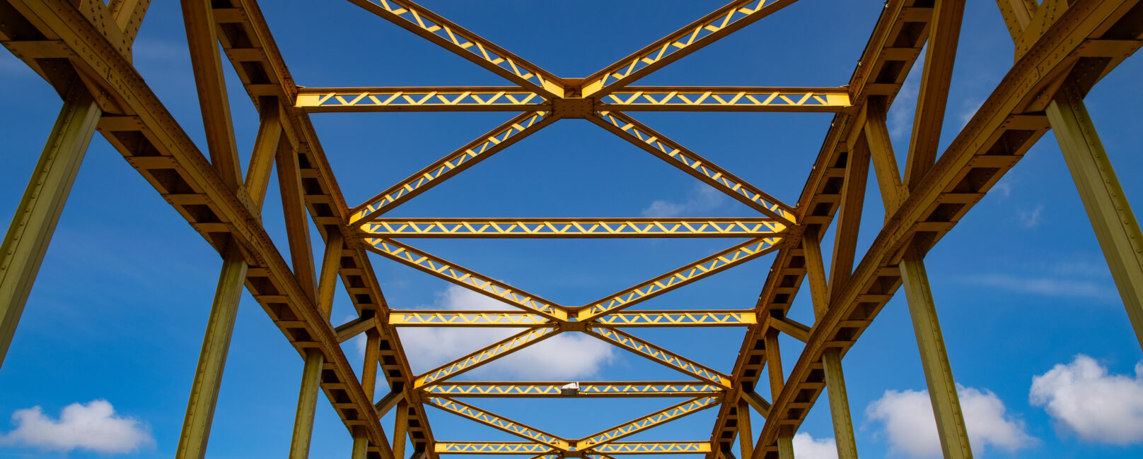 Old iron arch bridge. Construction metal frame