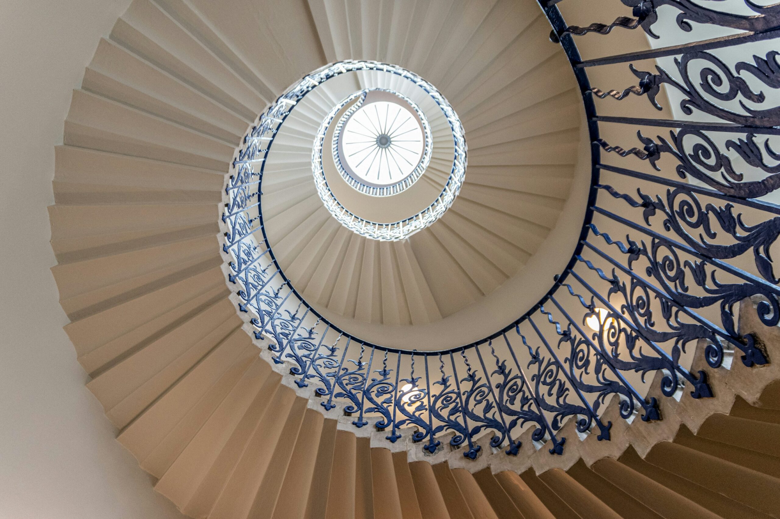 Looking up through the spiral staircase at Queen’s House, Greenwich, London